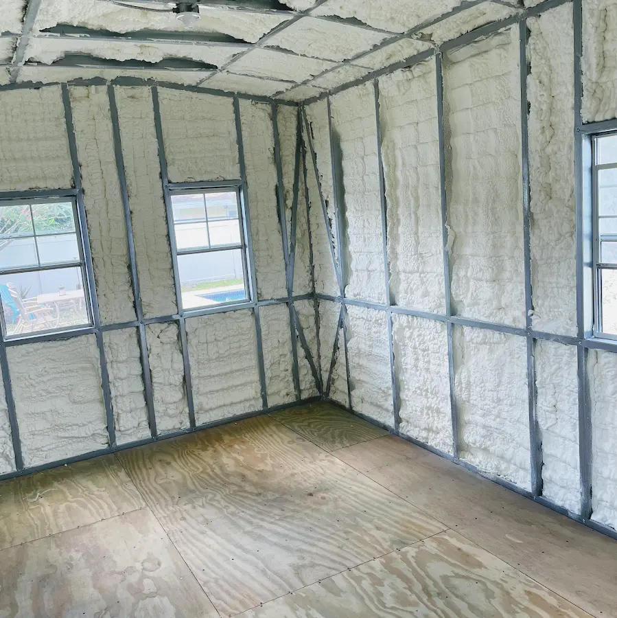 Closed-cell spray foam insulation applied to wall cavities in a residential project in Woodway